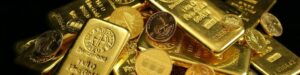 Goldbarren und Münzen